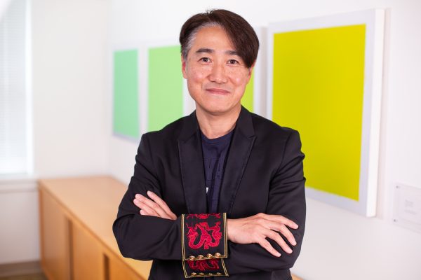 Academic camera headshot of a professor, reflecting leadership and commitment to research and education.