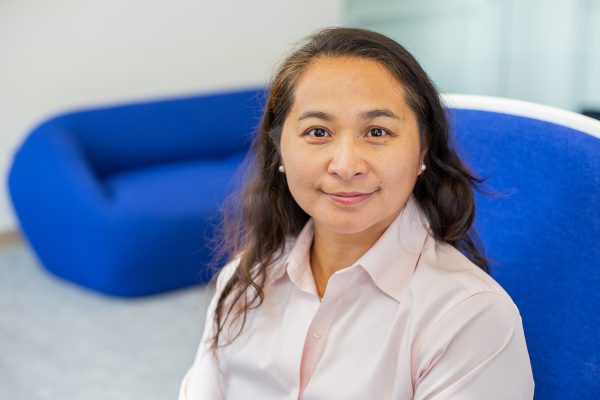 Professional photoshoot headshot of a university professor, showcasing expertise and approachability in academia.