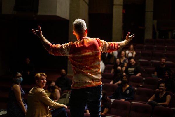 Striking stage photo featuring dynamic lighting, expressive performances, and immersive storytelling