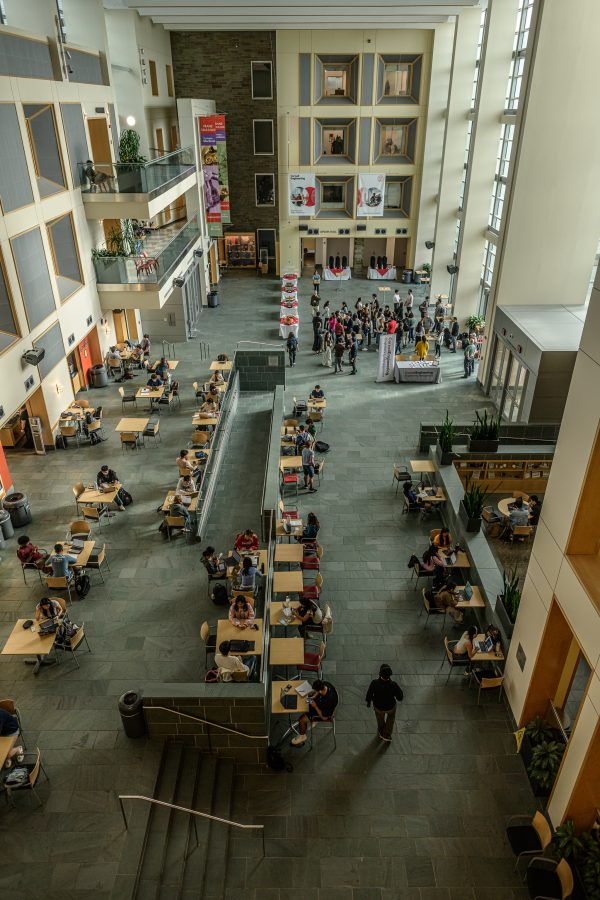 High-resolution photography showcasing real moments of student learning, faculty interaction, and campus life.